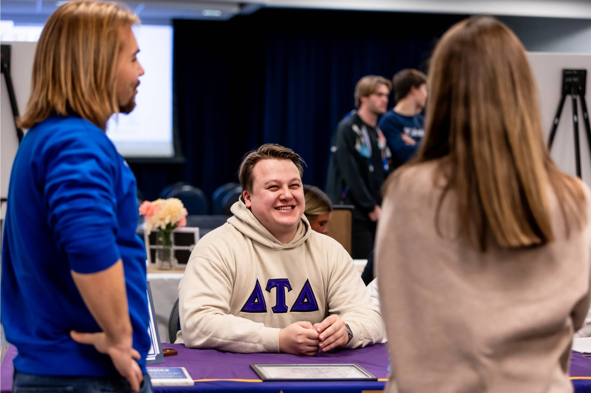 Members tabling for their fraternity